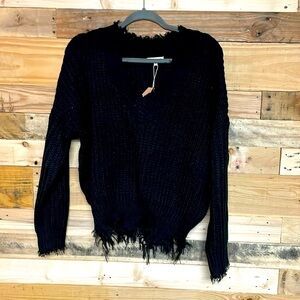 Main Strip size medium black v-neck distress acrylic sweater